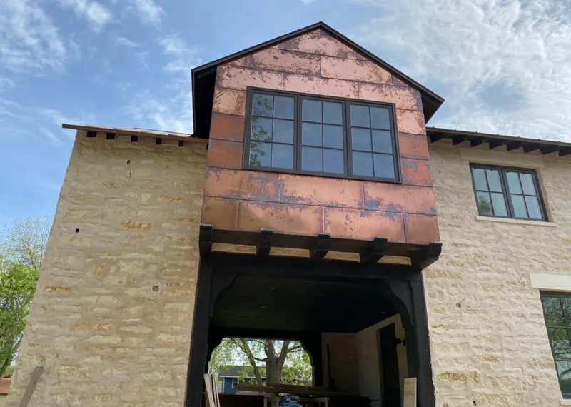 Copper metal panel facade on a stone building for Skylight Installation in Mount Kisco