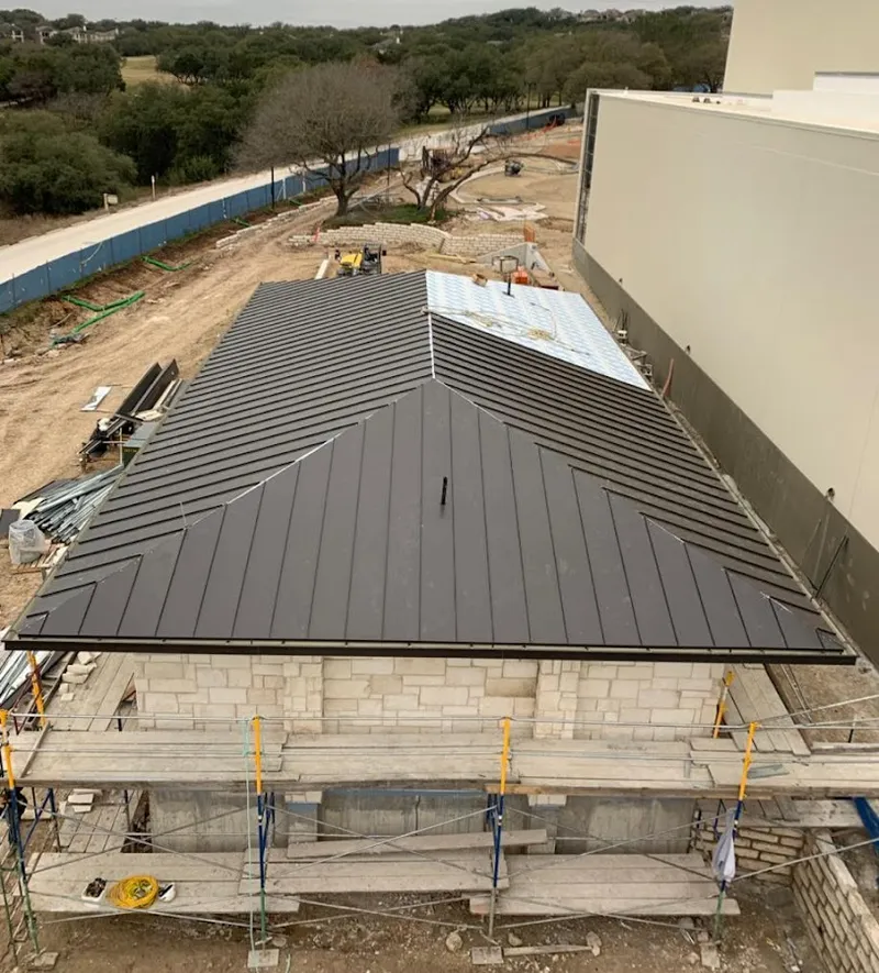 Metal roof new construction with scaffolding in Mount Kisco